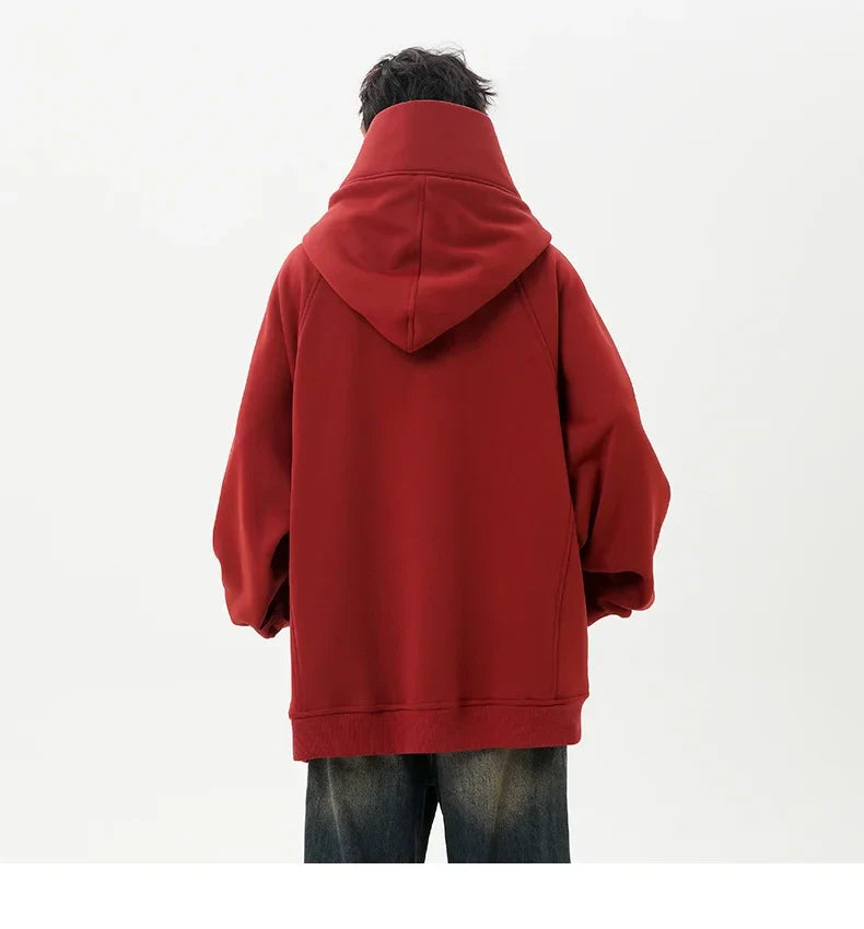 Person wearing a red hoodie from behind on a white background