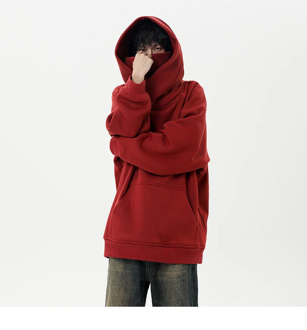 Person wearing a red hoodie on a white background