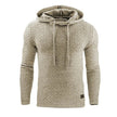 Beige knitted hoodie with a textured pattern on a white background