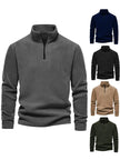 Collection of men's quarter-zip pullovers in various colors on a white background