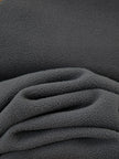 Close-up of dark gray textured fabric
