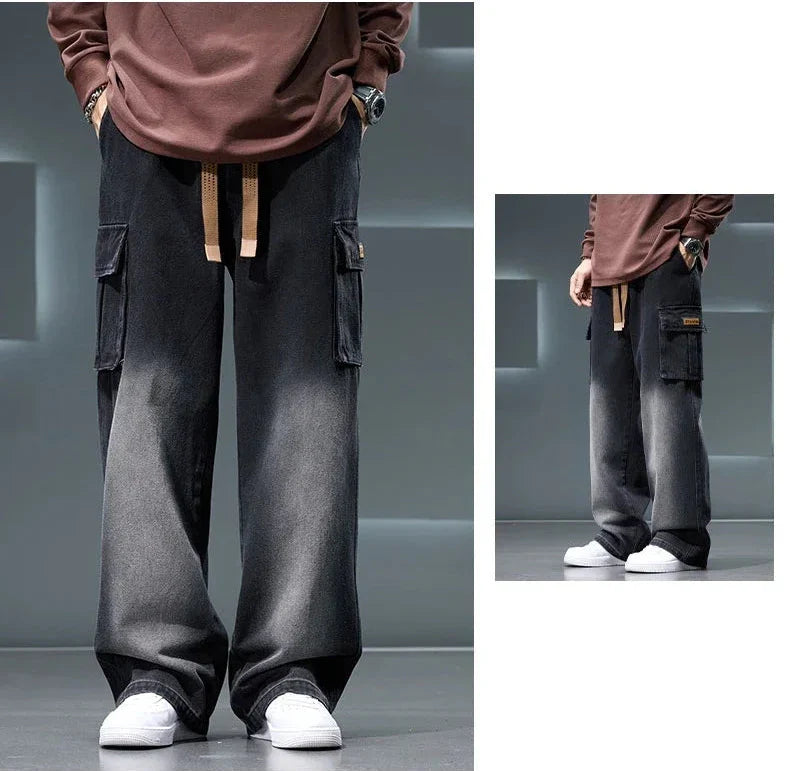 Person wearing dark gray cargo pants with a brown shirt in a minimalistic setting.