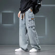 Person wearing light blue cargo pants with a blurred background