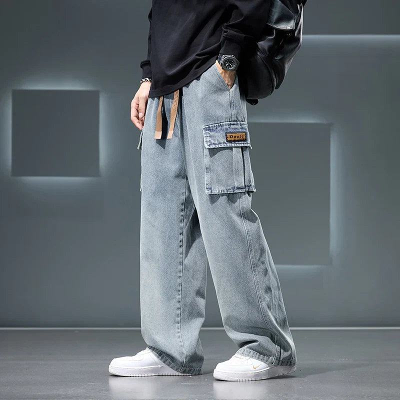Person wearing light blue cargo pants with a blurred background
