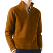 Brown sweater worn by a person on a white background