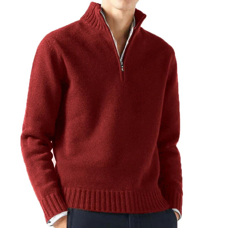 Red half-zip sweater worn by a person on a white background