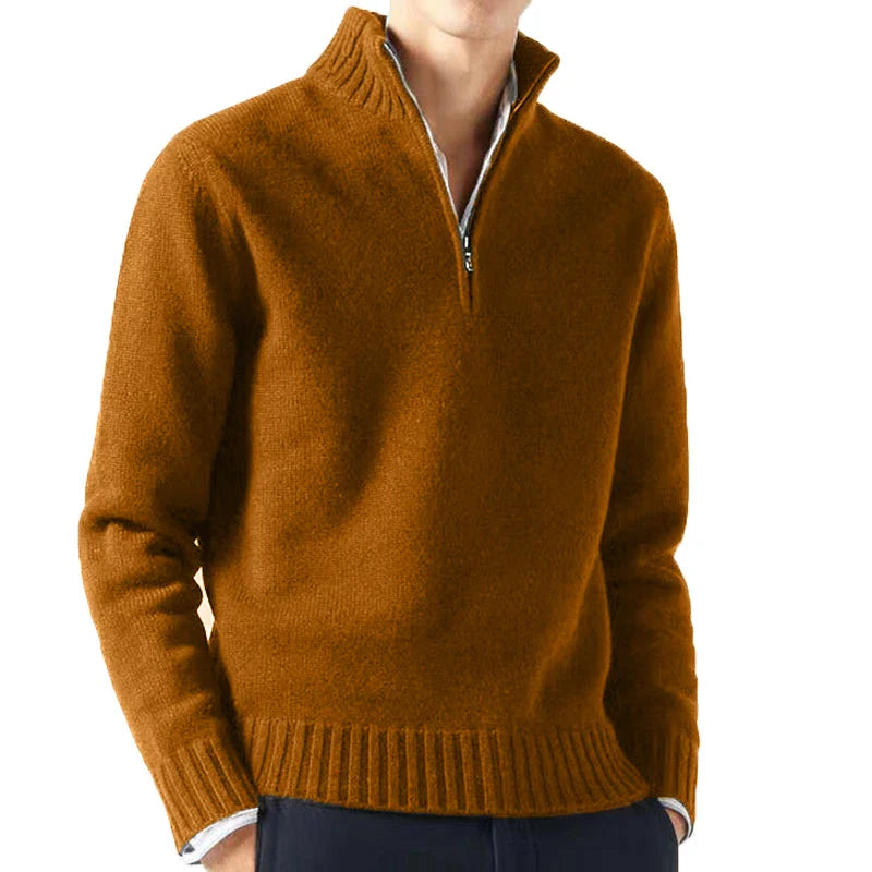 Brown sweater worn by a person on a white background