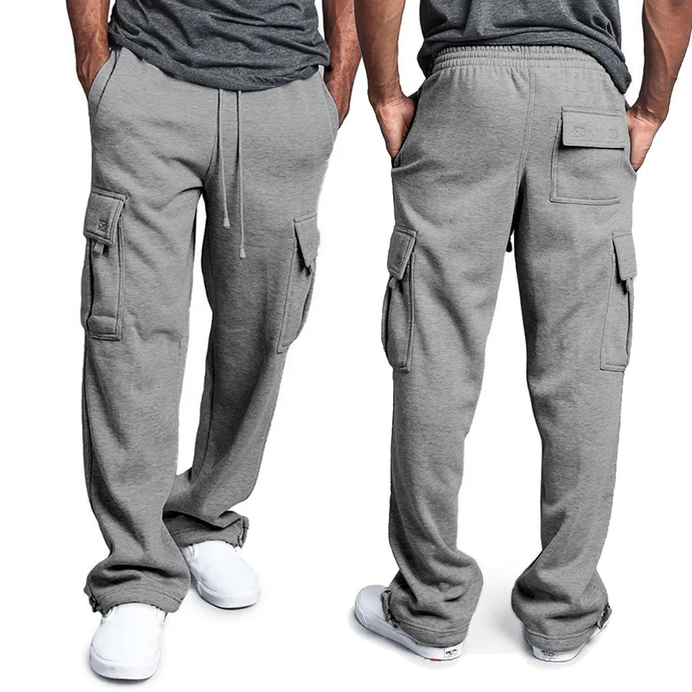 Gray cargo sweatpants worn by a person on a white background