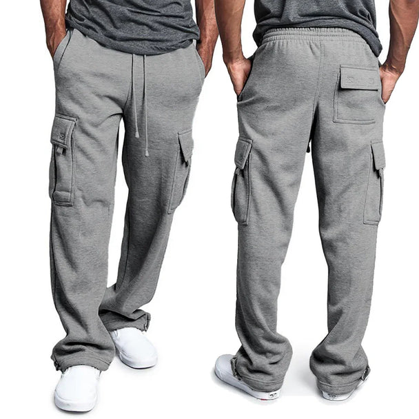 Gray cargo sweatpants worn by a person on a white background
