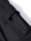Close-up of a black jacket with a white background