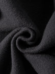 Close-up of dark gray fabric with a textured surface