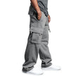 Person wearing gray cargo pants on a white background