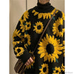 Black sweater with yellow sunflower patterns worn by a person.